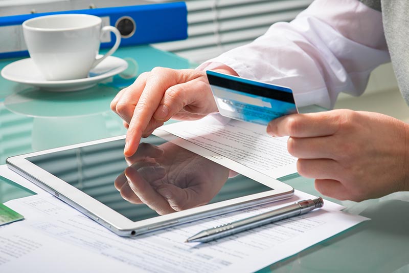 Woman using credit card